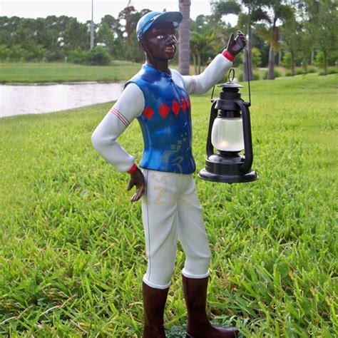 Old Black Americana Cast Iron Lawn Jockey Hitching Post - The statue is in great condition and the paint is vibrant; measures 18 12" x 10" x 16 38". . Lawn jockey statue for sale